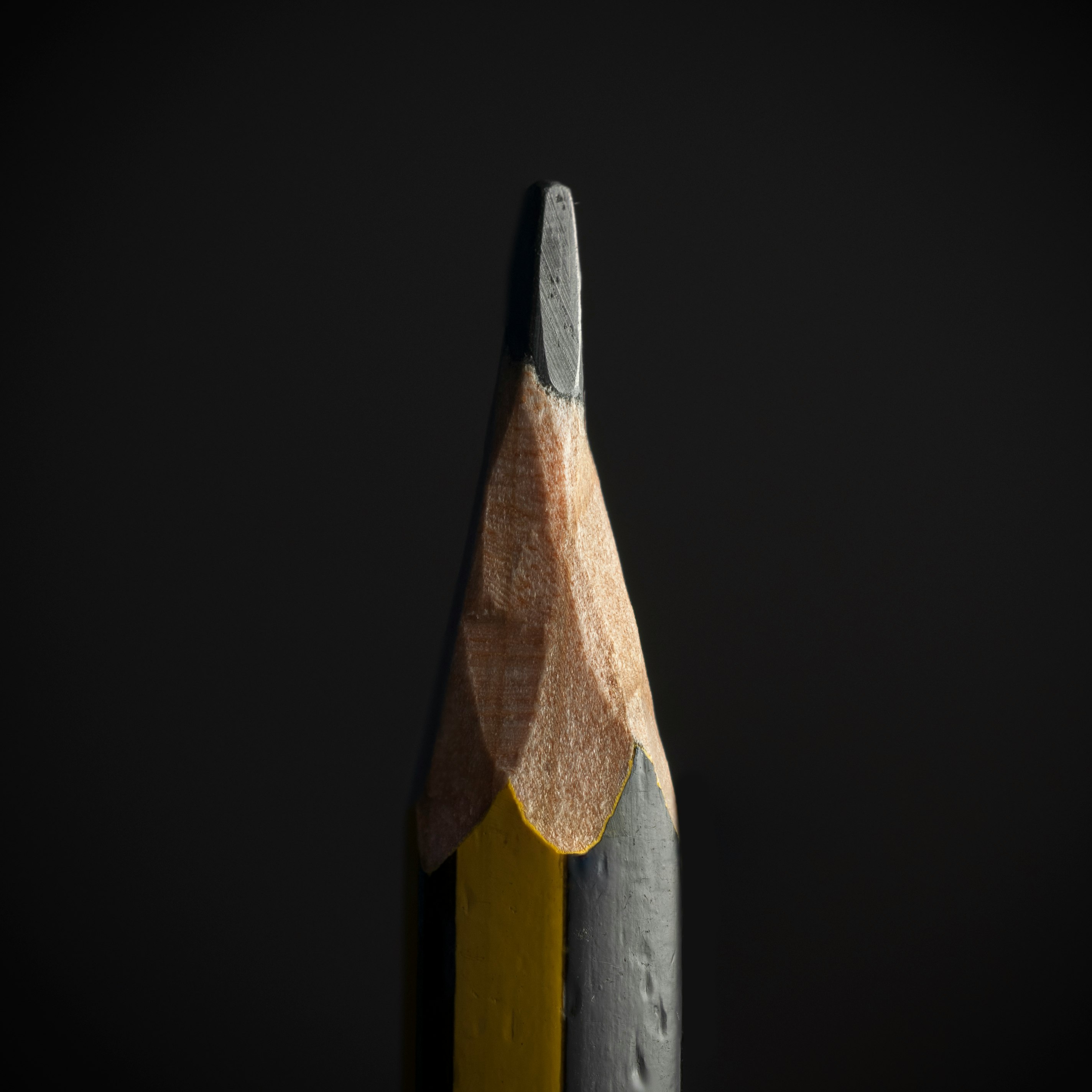 black pencil on black background